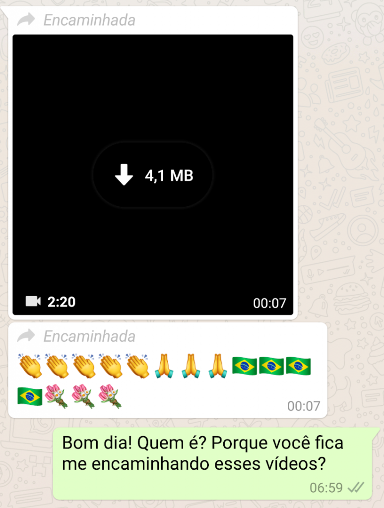 Print screen de conversa no WhatsApp. Um pessoa segue um vídeo acompanhado de emojis. A outra responde: Bom dia! Quem é? Porque você fica me encaminhando esses vídeos?