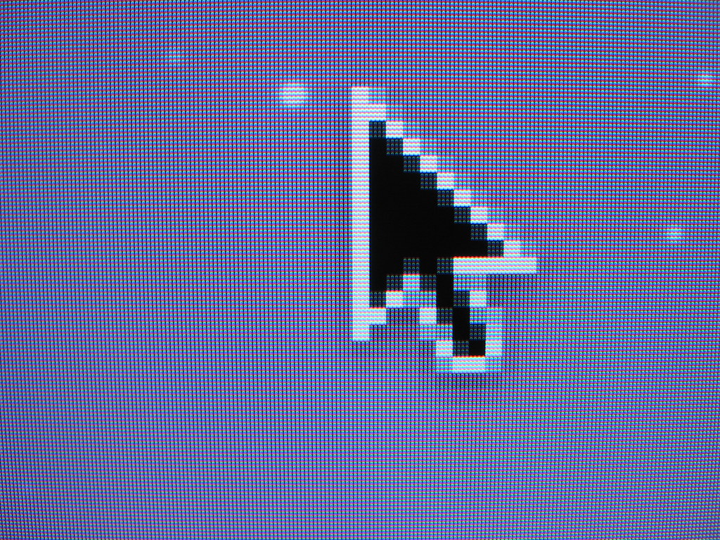 Imagem ilustrativa de um cursor do mouse em formato de seta.